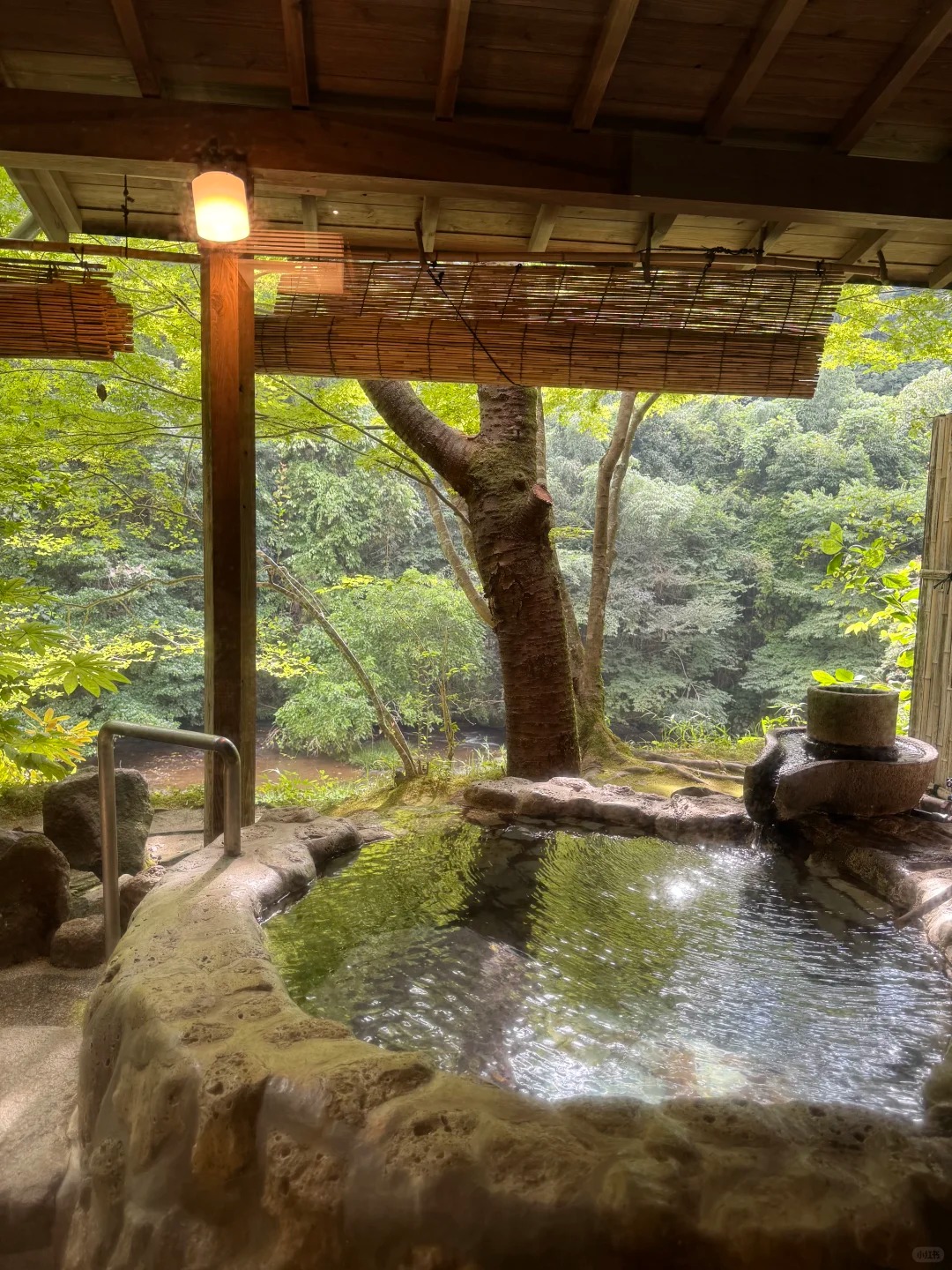 Traditional outdoor onsen hot spring bath