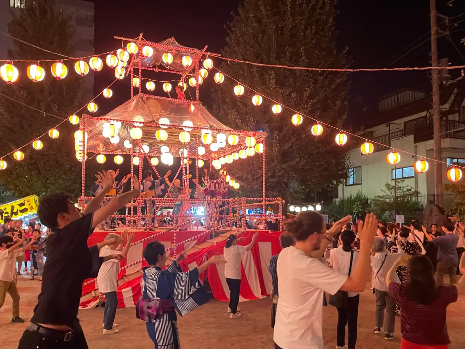 Traditional Bon odori lanterns floating at night during Obon