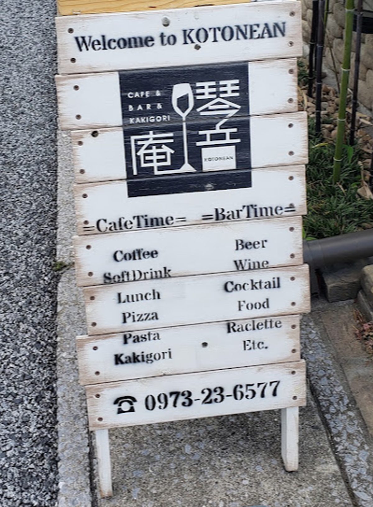 Welcome to Kotonean sidewalk sign with hours and menu